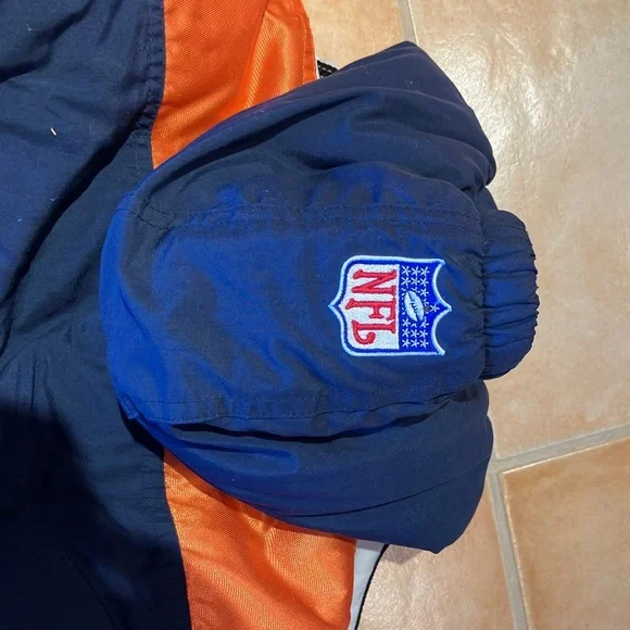 This is a boy’s large jacket. It is 100% polyester. The shell is 100% nylon. - Picture 2 of 6